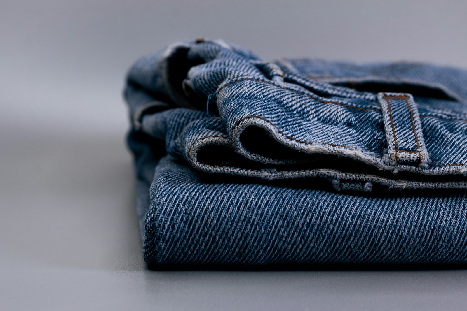 blue denim textile on white table